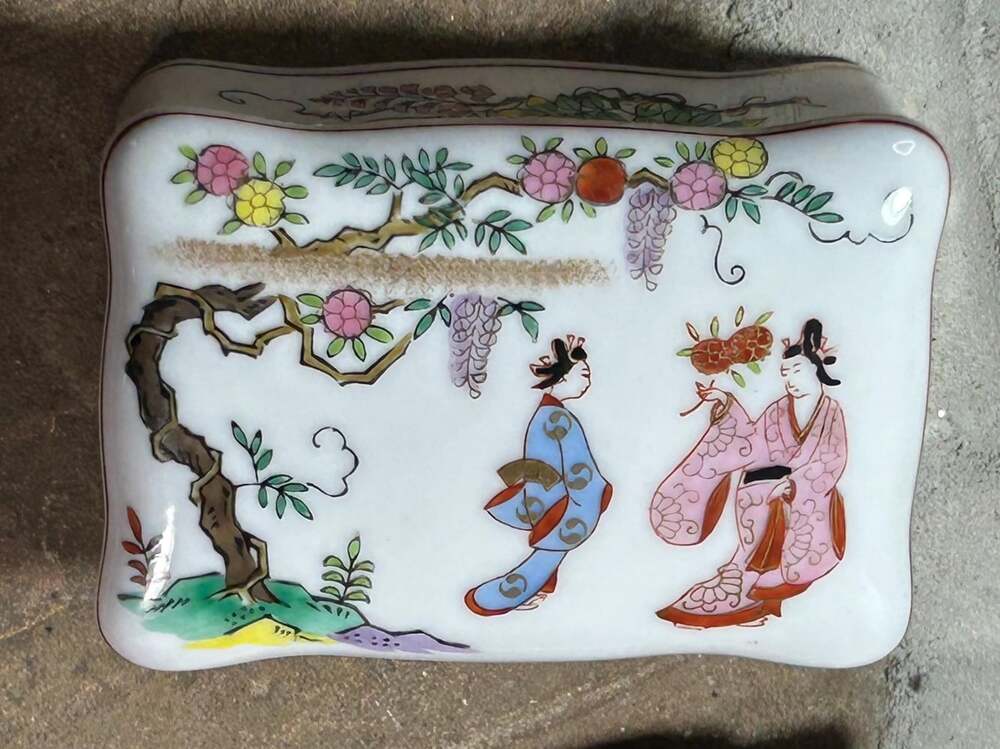A Serene Scene of Japanese Ladies in Spring enjoying the outdoors are painted on